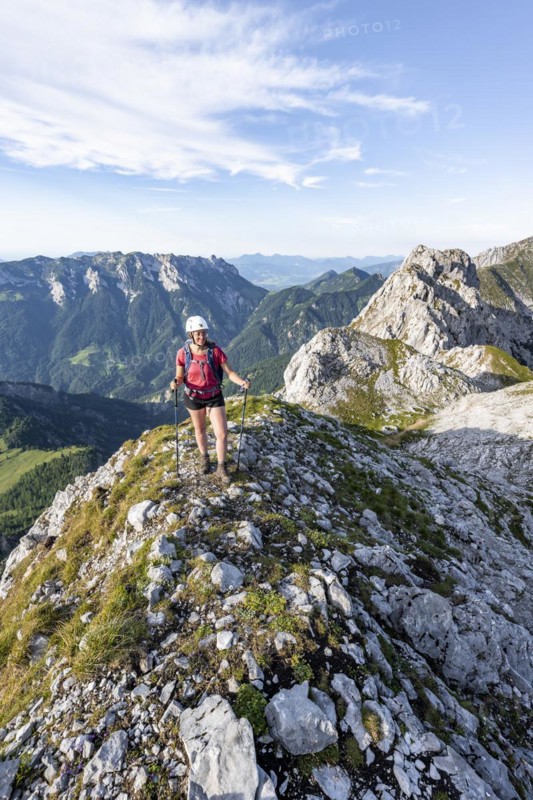 Hiker on a ridge in the mountains, Schaffauer, Wilder Kaiser, Tyrol, Austria