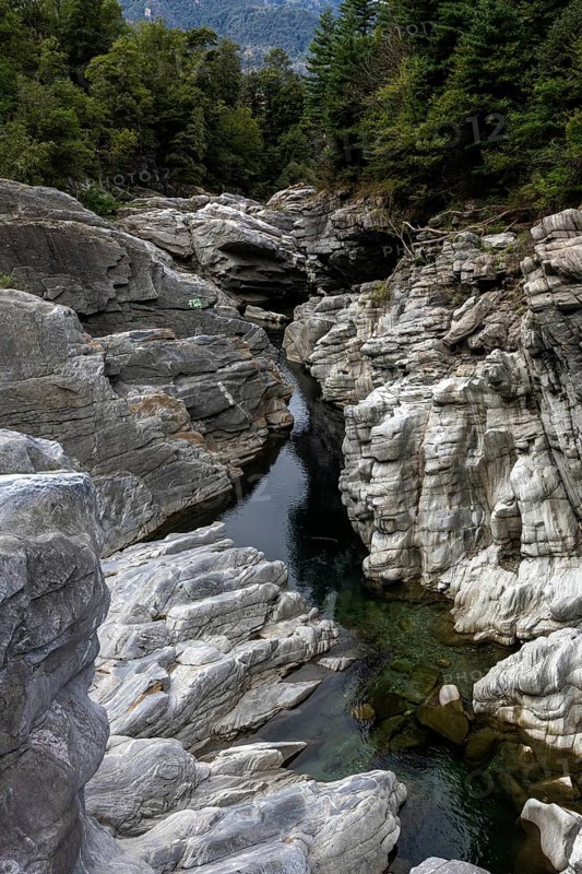Rocks, granite rock formations in the Maggia River near Ponte Brolla, in the Maggia Valley, Valle Maggia, Canton Ticino, Switzerland