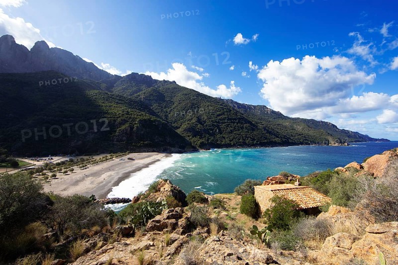 View of the pebble beach and Porto Bay, a UNESCO World Heritage Site, Ota, west coast of Corsica, Corse-du-Sud, Corsica, France