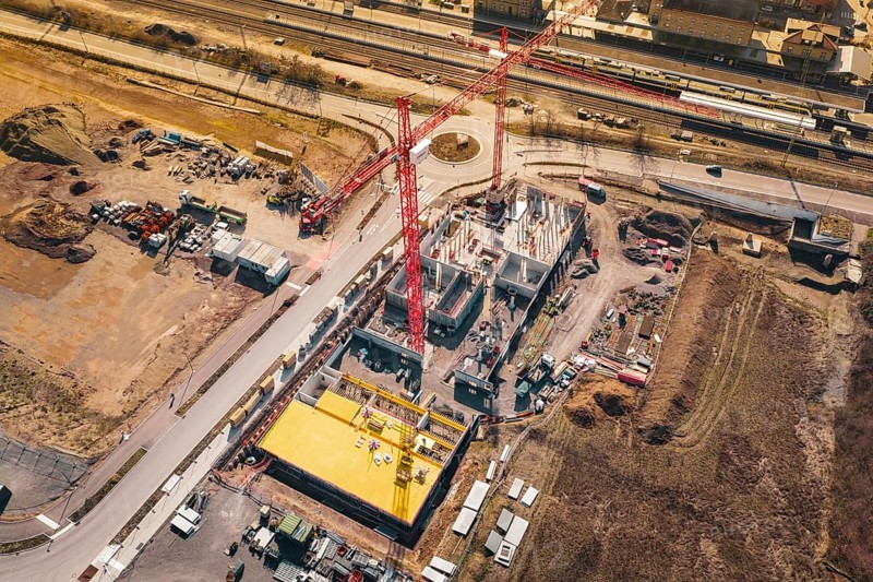 Construction near roads and railways, with significant use of cranes and materials, new Mühlacker nursing home, Enzkreis, Germany