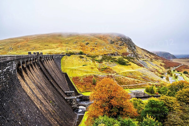 Autumn colors over Claerwen Dam, Claerwen Valley, Elan Valley Reservoir, Rhayader, Powys, Wales, UK