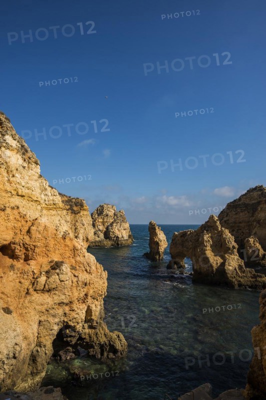Coastal landscape with colourful rocks, Ponta da Piedade, Lagos, Algarve, Portugal