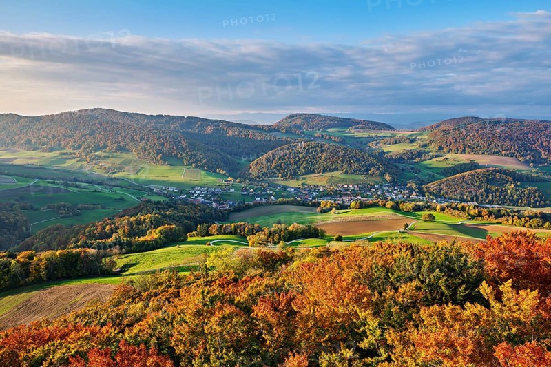 View from the Gisliflue of an autumnal forest with the Jura foothills behind, Talheim, Canton, Aargau, Switzerland