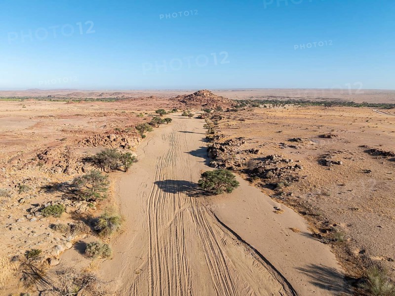 Aerial view, dry riverbed and desert landscape at Ugab River, Erongo, Damaraland, Namibia