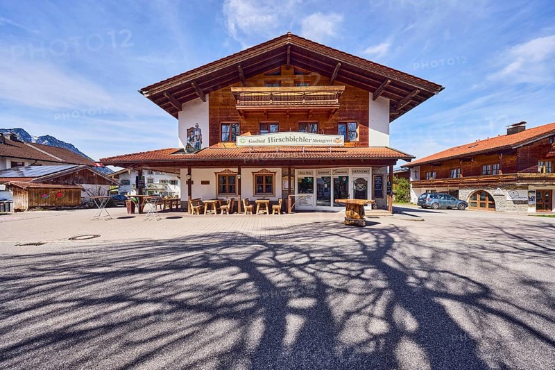 Gasthof und Metzgerei Hirschbichler, commercial building, alpine buildings, building material wood, outdoor area of a restaurant, shade of a tree, milky blue sky, cirrostratus clouds, cirrus clouds, Traunsteiner Straße, Inzell, Traunstein district, Bavaria, Germany