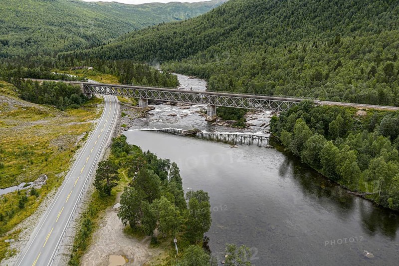 Raufjellfossen railway bridge, Nordland railway (Nordlandsbanen), waterfall at Ranelva river, near Mo i Rana, aerial view, Norway
