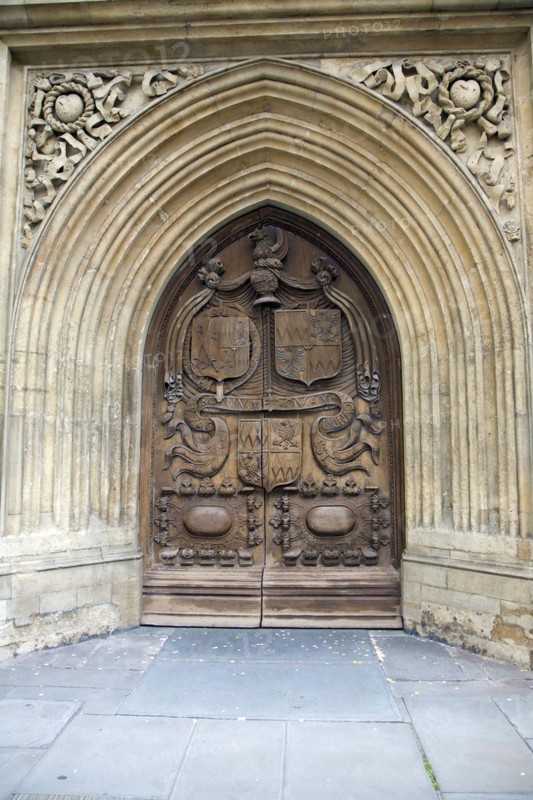 Wooden carved door of the abbey church, Bath, England, United Kingdom