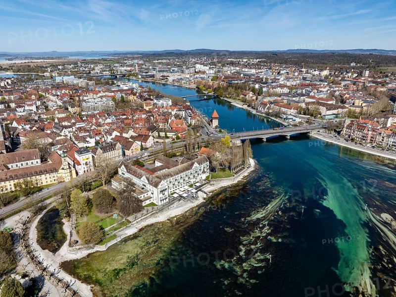 Aerial view of Lake Constance with the Seerhein, also Rhine funnel and the old town of Constance with the Steigenberger Inselhotel, former Dominican monastery, on the left the island canal at low water, on the right the old Rhine bridge, where the Rhine officially begins at kilometre zero, above the historic Rhine gate tower, district of Constance, Baden-Württemberg, Germany