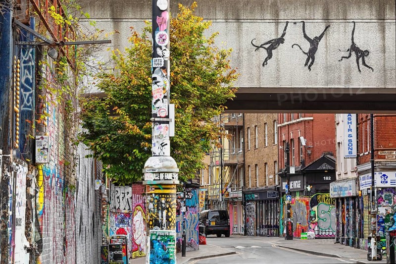 Banksy graffiti of the three monkeys in Brick Lane, East End, London, England, Great Britain, London, South England, Great Britain