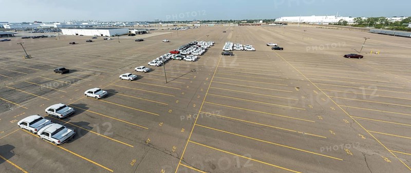 Detroit, Michigan - A mostly empty parking lot at Stellantis' Jefferson North Assembly Plant. After a year of sharply declining sales and profits, the multinational company is hoping that new CEO Antonio Filosa can lead a turnaround
