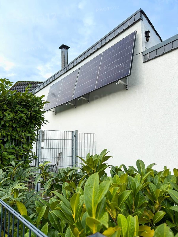 Solar panels on a house wall in Hilden, Germany