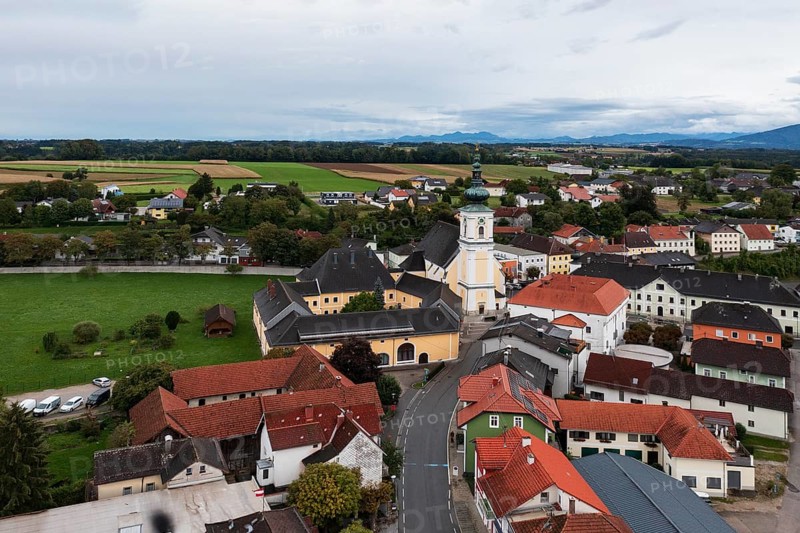 Drone shot, view of village, parish church, Vorchdorf, Traunviertel, Upper Austria, Austria