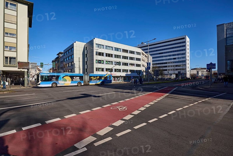 Residential and commercial building, modern architecture, cycle path, lantern, public bus, blue sky, cloudless, intersection between Eisenbahnstraße and Stengelstraße, Saarbrücken, state capital, regional association Saarbrücken, Saarland, Germany