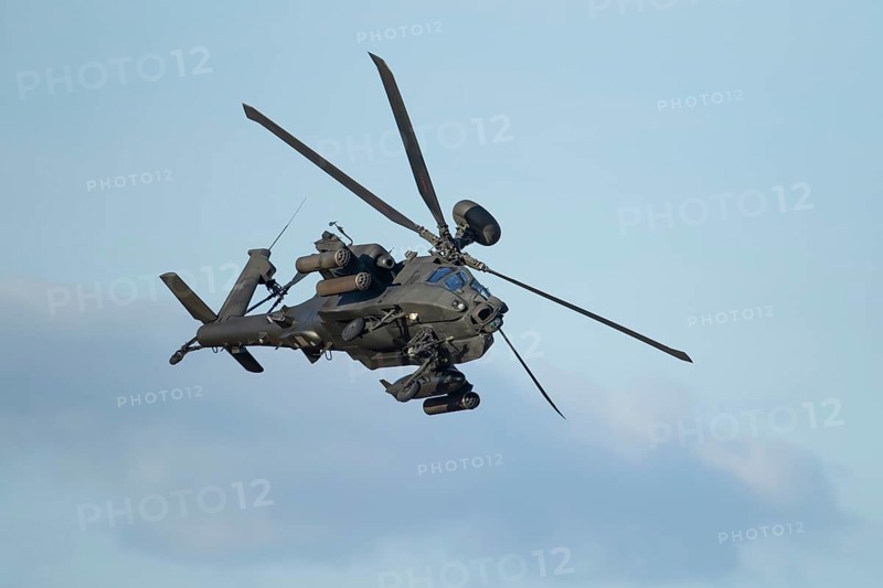 Agusta Westland AH-64 Apache helicopter aircraft in British Army air corps colours flying, England, United Kingdom