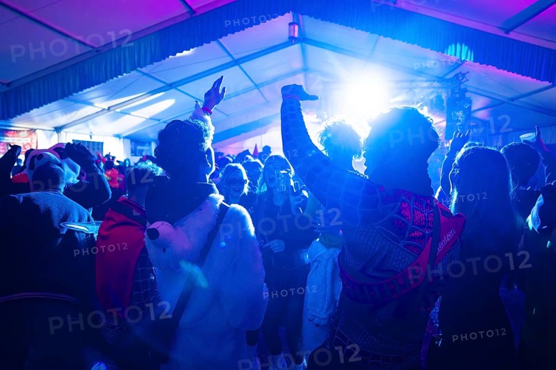 Lively party atmosphere with costumed people and light effects, carnival, Schlagerkuchen Donzdorf, district of Göppingen, Germany