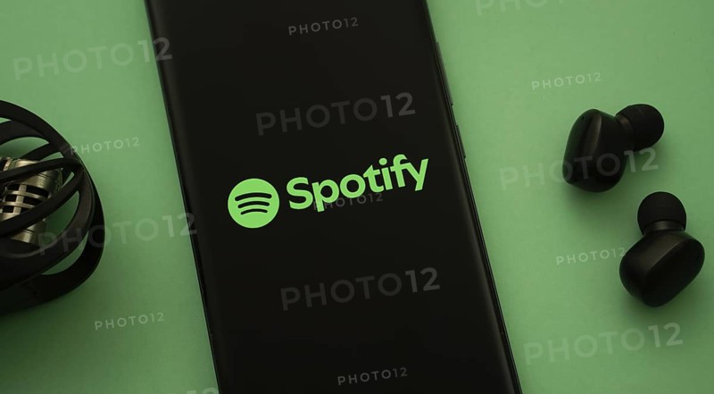 Dhaka, Bangladesh - 18 March 2025: The logo of the spotify is displayed on a smartphone screen
