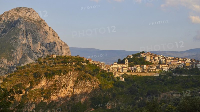 Evening light, mountain, village on hill, Militello Rosmarino, village, Nebrodi National Park, Sicily, Italy