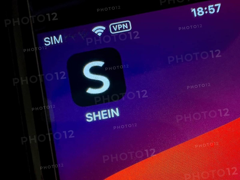App symbol of Chinese online retailer SHEIN on smartphone, international