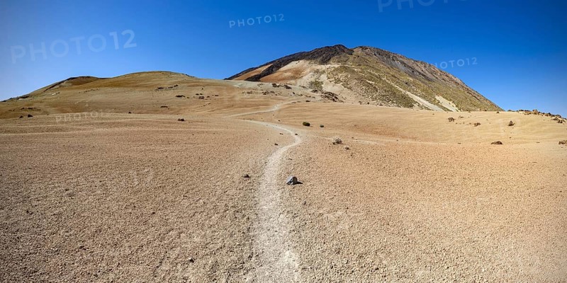 Hiking trail and rock formations, volcanic landscape in El Teide National Park, behind it the Pico del Teide, 3715m, World Heritage Site, Tenerife, Canary Islands, Spain