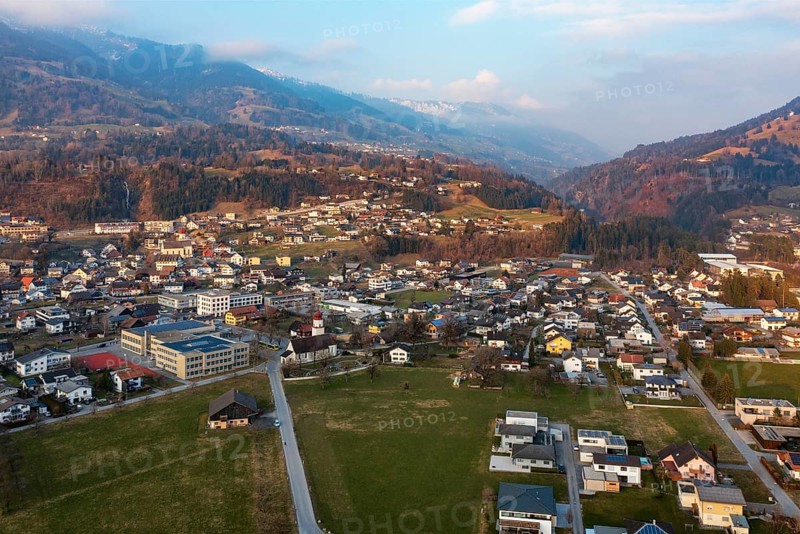 Drone image, residential buildings, settlement area, parish church, Thuringia, Großes Walsertal, Vorarlberg, Austria