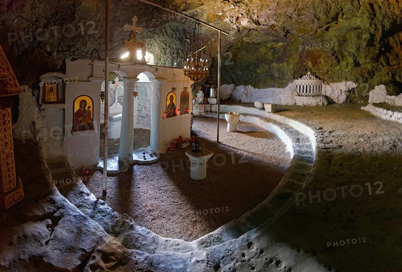 Cave church of St John Vrykountas with icons and altars, which conveys a calm, spiritual atmosphere, hike to the ancient Doric city of Vrougounda and the cave church of St John Vrykountas, Avlona, Karpathos, Greece