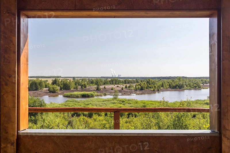 Viewpoint at Lake Bergen, which is still being flooded, with the towers of the Schwarze Pumpe power station in the background, Lusatian Lakeland, Saxony, Germany
