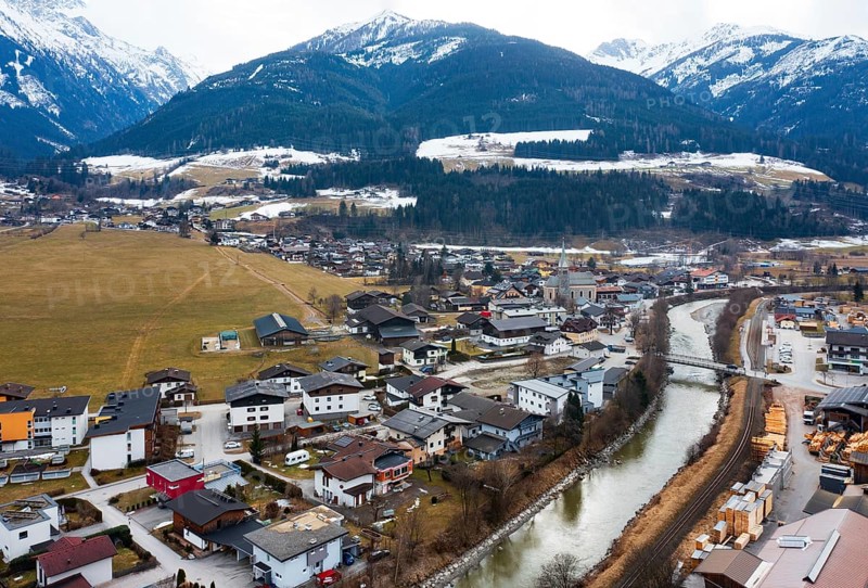 Drone image, residential buildings, view of village with parish church, Niedernsill, Salzach, Pinzgau, Salzburg province, Austria