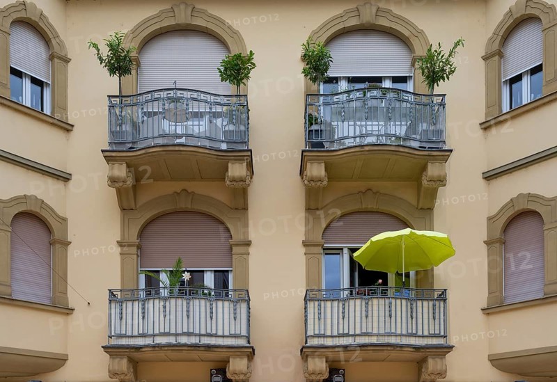 Balconies of the former Hotel Krosse, now a residential and commercial building, built in Baroque Art Nouveau style in 1907-08, Bad Kissingen, Lower Franconia, Bavaria, Germany