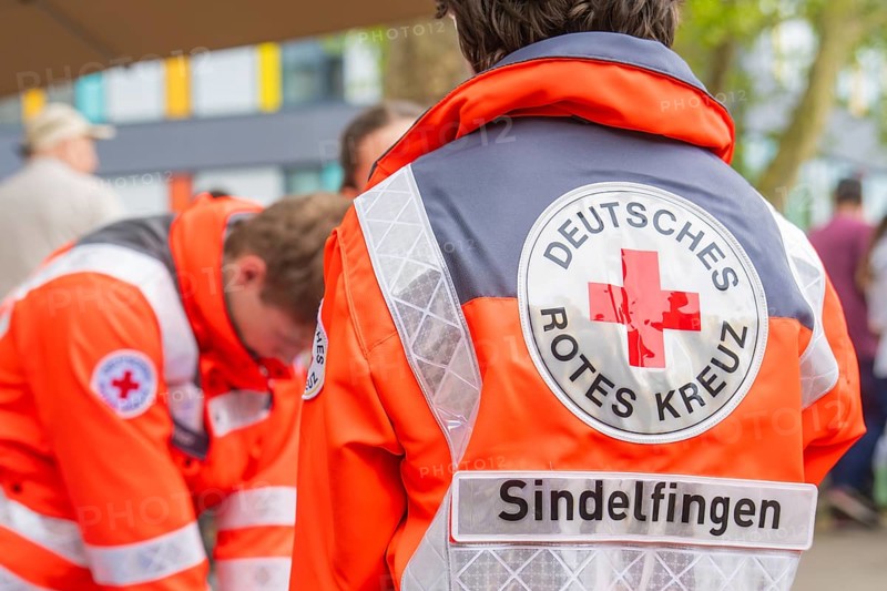 Close-up of paramedics in German Red Cross uniforms on a mission, Sindelfingen, Böblingen district, Germany