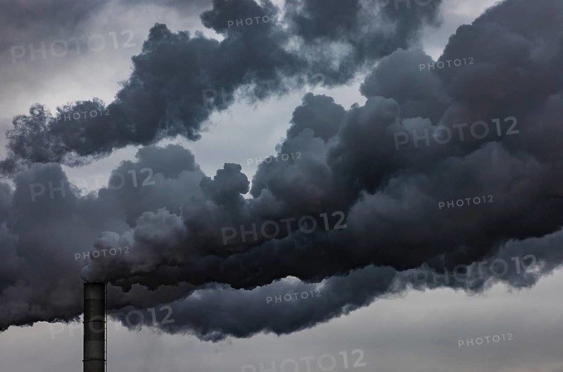 Pollution, industry, smoke pouring out of a factory chimney, Lenzing, Upper Austria, Austria