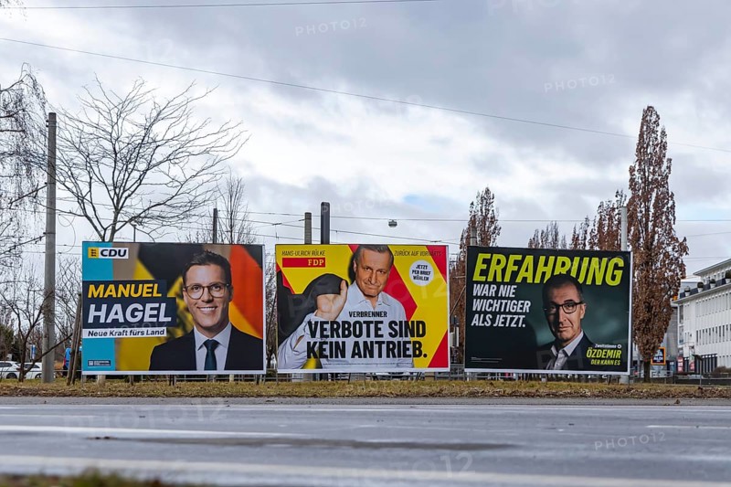 Election advertising for the 2026 state election in Baden-Württemberg. Large posters of the Green Party, CDU and FDP. Top candidates Manuel Hagel and Cem Özdemir. Fellbach, Baden-Württemberg, Germany
