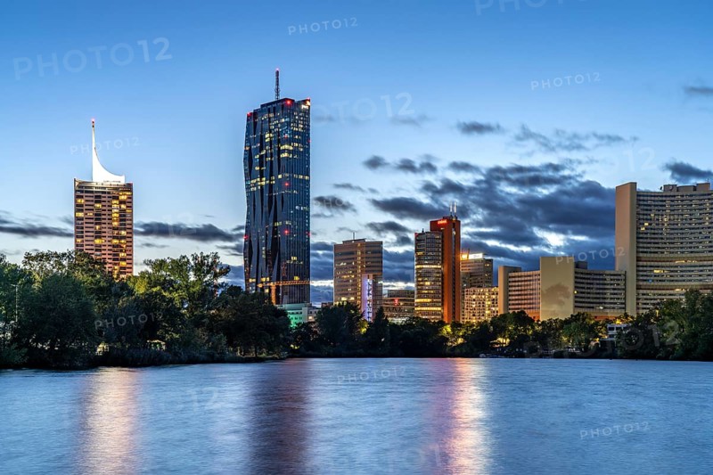 Kaiserwasser, UNO-City and the skyline of Donau City at dusk, Vienna, Austria