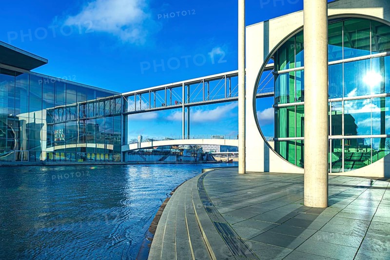 Spreebogen at the library of the German Bundestag with view of Paul-Löbe-Haus, Bundestag and Jakob-Mierscheid-Steg in Berlin, Germany
