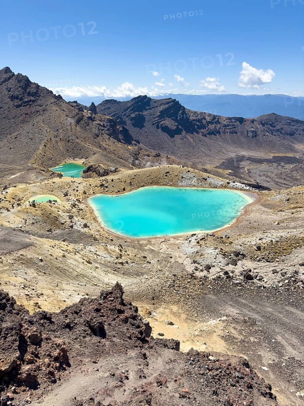 On the hiking trail of the Tongariro Alpine Crossing in Tongariro National Park with a view of the Emerald Lakes, North Island, New Zealand, Oceania