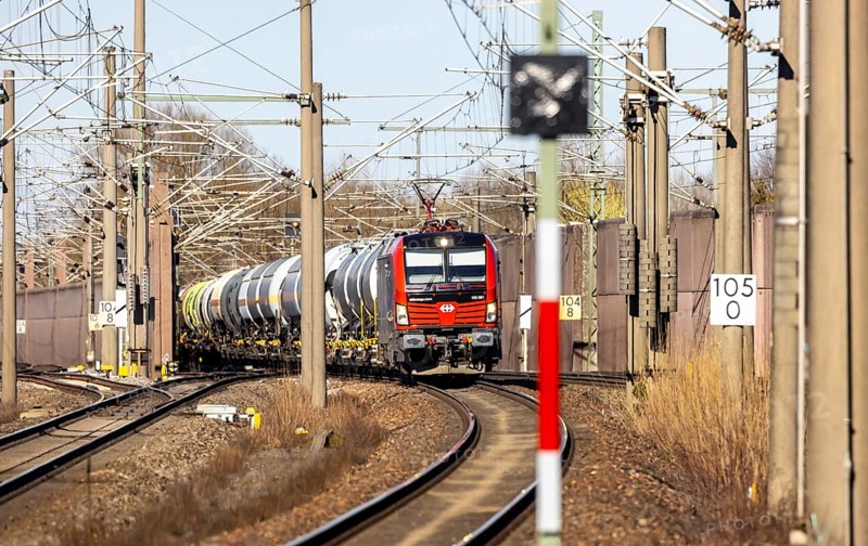 Goods train with Swiss locomotive passing through Baden-Baden station on the Rhine Valley line. SBB Cargo is a brand of the Swiss Federal Railways for freight transport. Baden-Baden, Baden-Württemberg, Germany