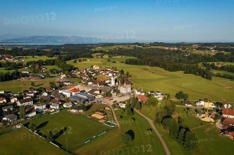 Drone image, view of village with parish church, Hohenweiler, Vorarlberg, Austria