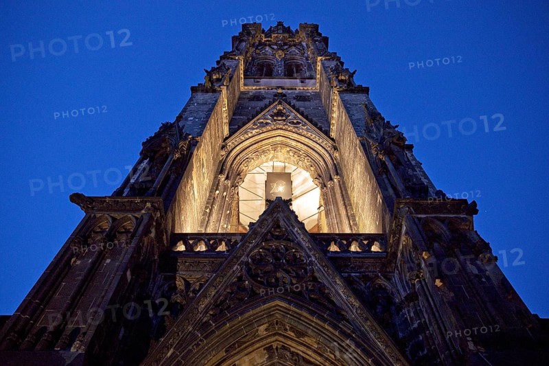 Illuminated church tower of the St. Nikolai memorial, ruins of the former main church of St. Nikolai, Hamburg, Germany