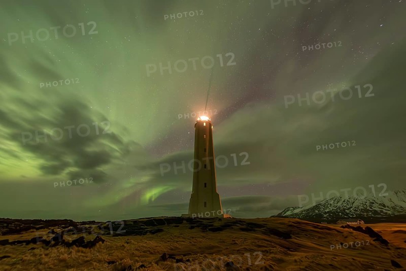 Northern lights or aurora borealis, lighthouse sends light signal, Malarríf, Snæfellsnes Peninsula, Snæfellsjökull National Park, Iceland