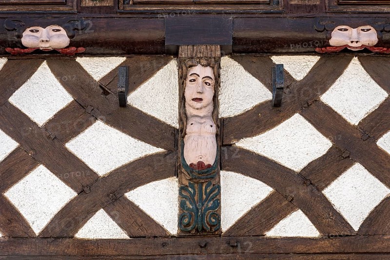 House Schmidt, historical half-timbered house of the baroque period, beams with rough carvings, colourfully painted, female figure naked, upper body, breasts, decor. colourful, old town, Hadamar, Limburg-Weilburg, Westerwald, Hesse, Germany