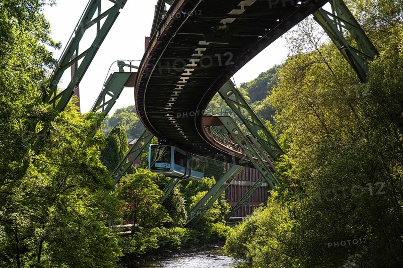 A suspension railway over the riverbed of the Wupper near the Völklinger Straße stop in Wuppertal, Germany
