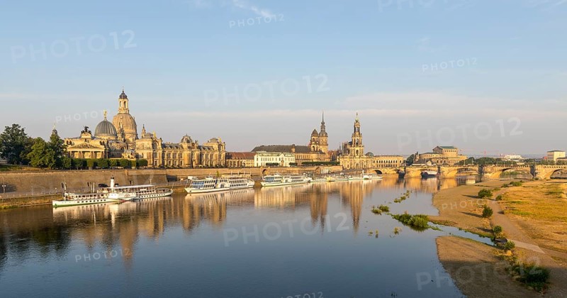 Silhouette of the Old Town with reflection in the Elbe in the morning, steamboats on the Terrassenufer, Brühl's Terrace, Academy of Fine Arts, Church of Our Lady, Sekundogenitur, Ständehaus, Hausmannsturm, Hofkirche and Semperoper, Dresden, Saxony, Germany