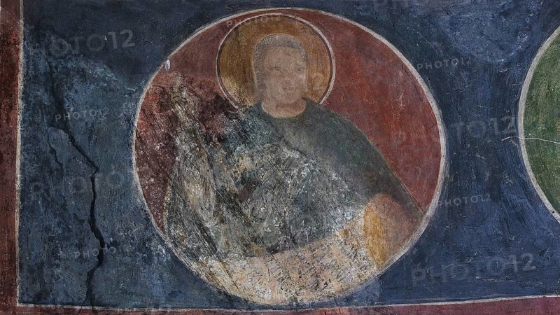Round mural painting of a holy person in a church, partially damaged and weathered, Byzantine chapel Agios Nikolaos Foundoukli, between Eleousa and Profitis Ilias, Rhodes, Dodecanese, Greek Islands, Greece