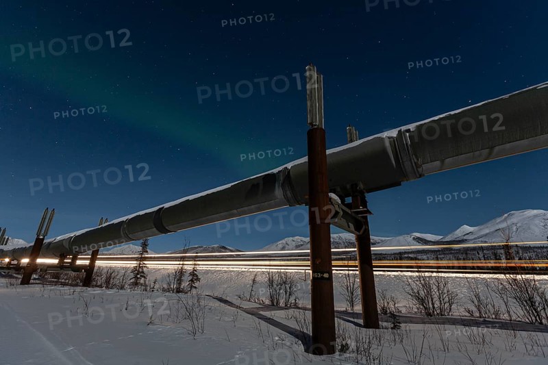 Oil production in the Arctic, Trans Alaska Pipeline, northern lights, night shot, winter, Dalton Highway, Alaska, USA