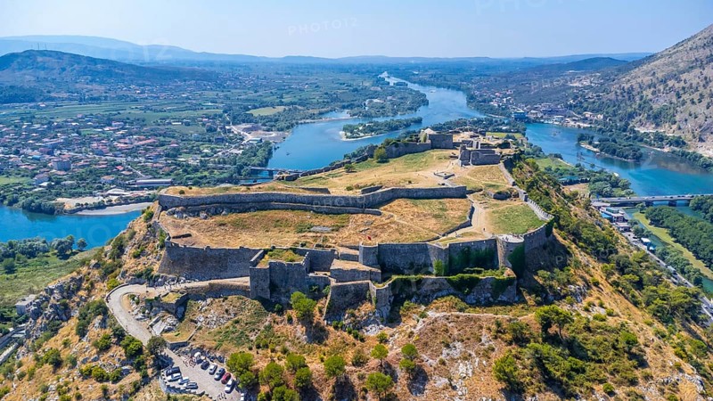 Aerial drone view of Rozafa Castle in the city Shkoder and its walls. Albania
