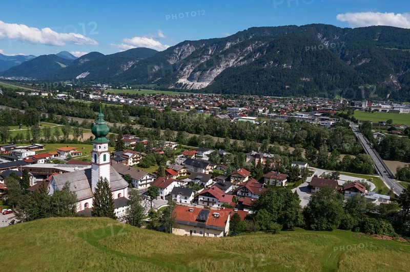 Drone image, view of village with parish church, Breitenbach am Inn, Inntal, Tyrol, Austria
