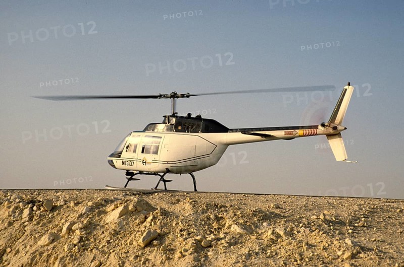 Oil industry in the Ras Tanura area, Saudi Arabia, Bell 206 JetRanger helicopter 1979