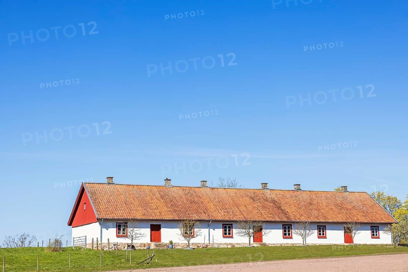 Old barn that has been converted into a residential house in the countryside, Sweden