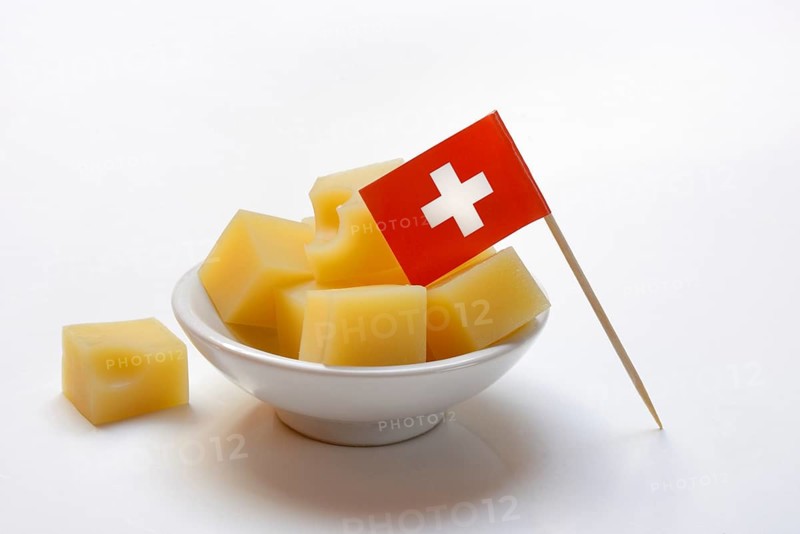 Emmental cheese in cubes with Swiss flag, Switzerland