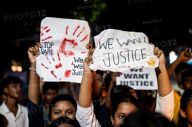 Students holds placard and shout slogans as they participate in a protest against the rape and murder of a doctor inside a hospital in Kolkata, on August 18, 2024 in Guwahati, India. A trainee doctor, 31, was attacked at RG Kar Medical College and Hospital in Kolkata, the capital of West Bengal, last week