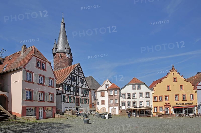 Historic houses with tail gables, half-timbered houses and old tower of the Protestant church, landmark, Town Hall Square, Rathausplatz, Ottweiler, Saarland, Germany